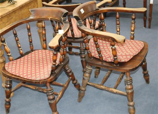 A set of five oak and beech captains chairs